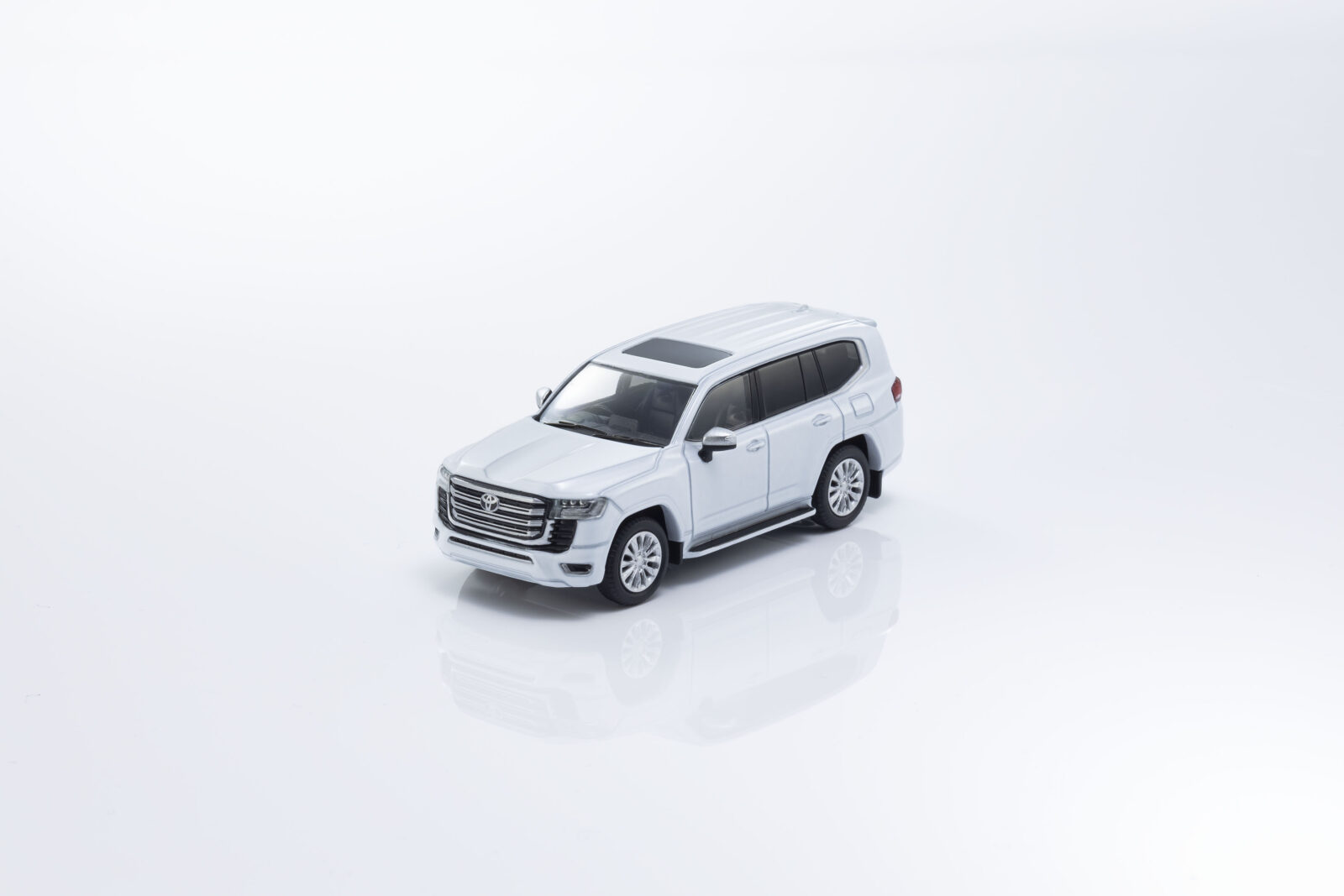 Toyota Land Cruiser 300 + Libro DS Modellismo Toyota Land Cruiser 300 Libro scala 1:64