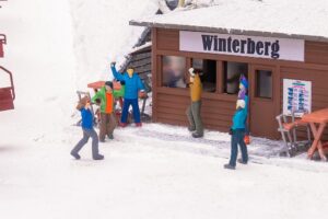 Festaioli dell'Après-Ski scala H0 Faller