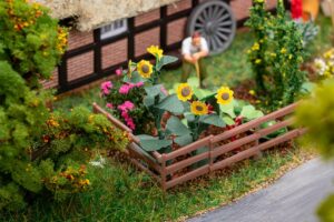 Fiori nel giardino anteriore scala H0 Faller